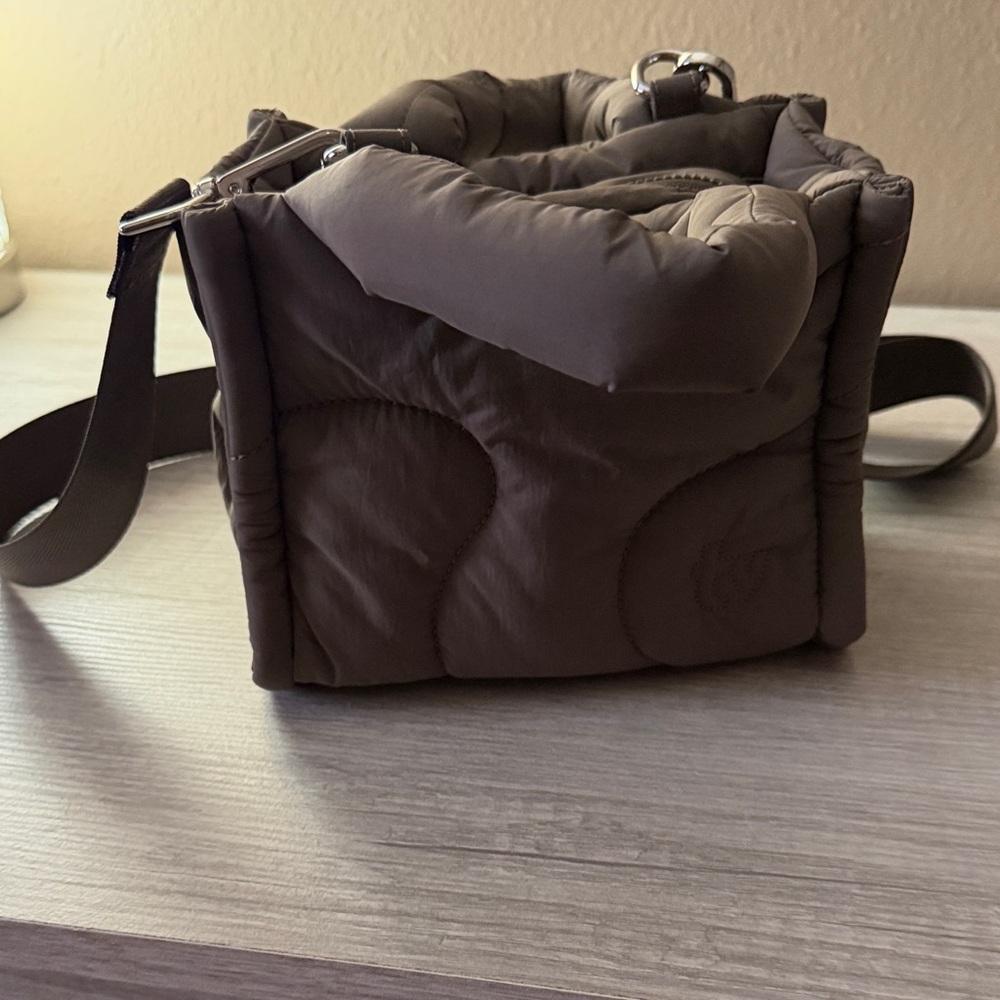Thirty years taupe puffer bag